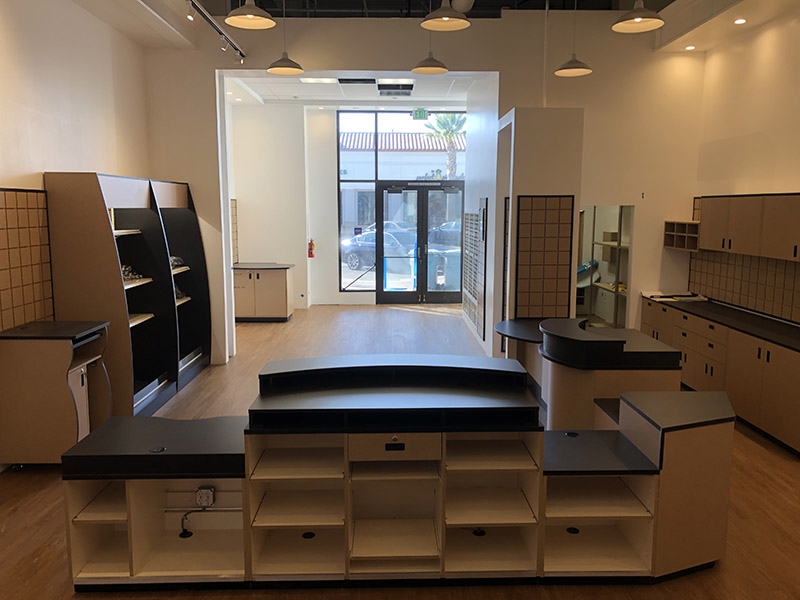 Photo showing fixtures and cabinets in newly completed UPS Store.